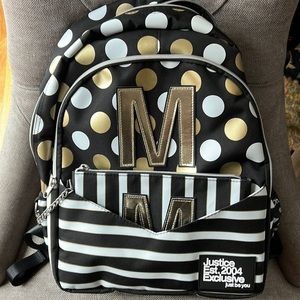 Never used “M” backpack! Black/Gold/White